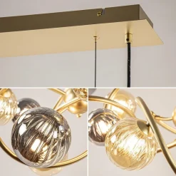 Straluma Grote hanglamp goud met amber/smoke glazen bollen></noscript> Hanglampen|Eettafellampen