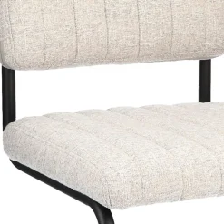 Straluma Stoffen eetkamerstoel met zwart metalen frame></noscript> Eetkamerstoelen